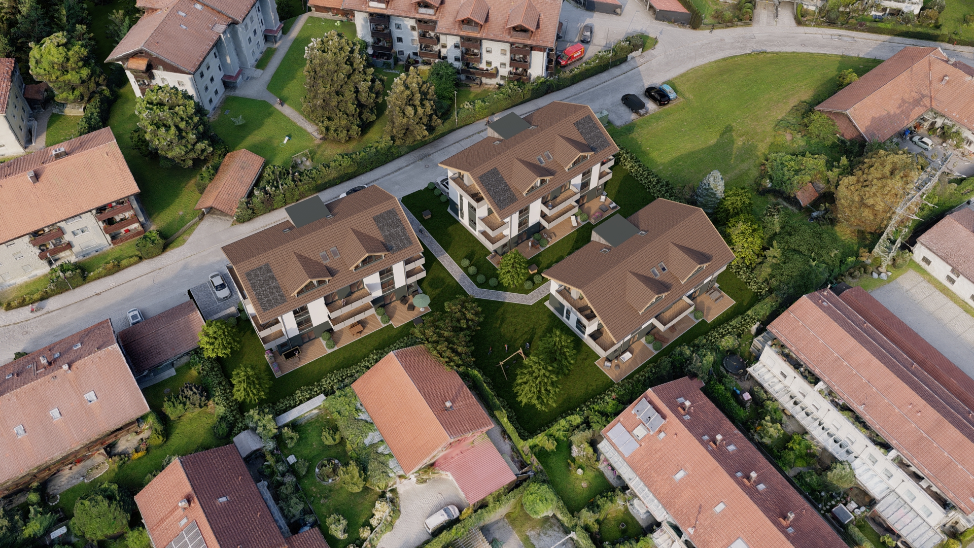 Luftaufnahme der Wohnanlage mit Blick auf die Dachlandschaft und Umgebung